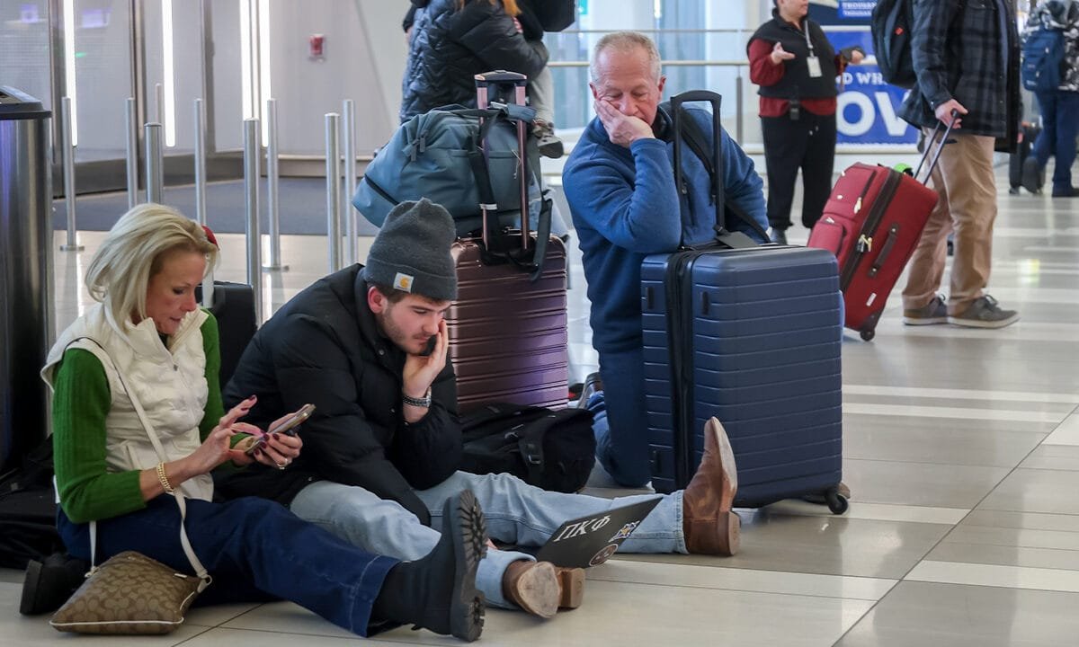 Christmas travelers left stranded as airports see mass flight cancelations, delays