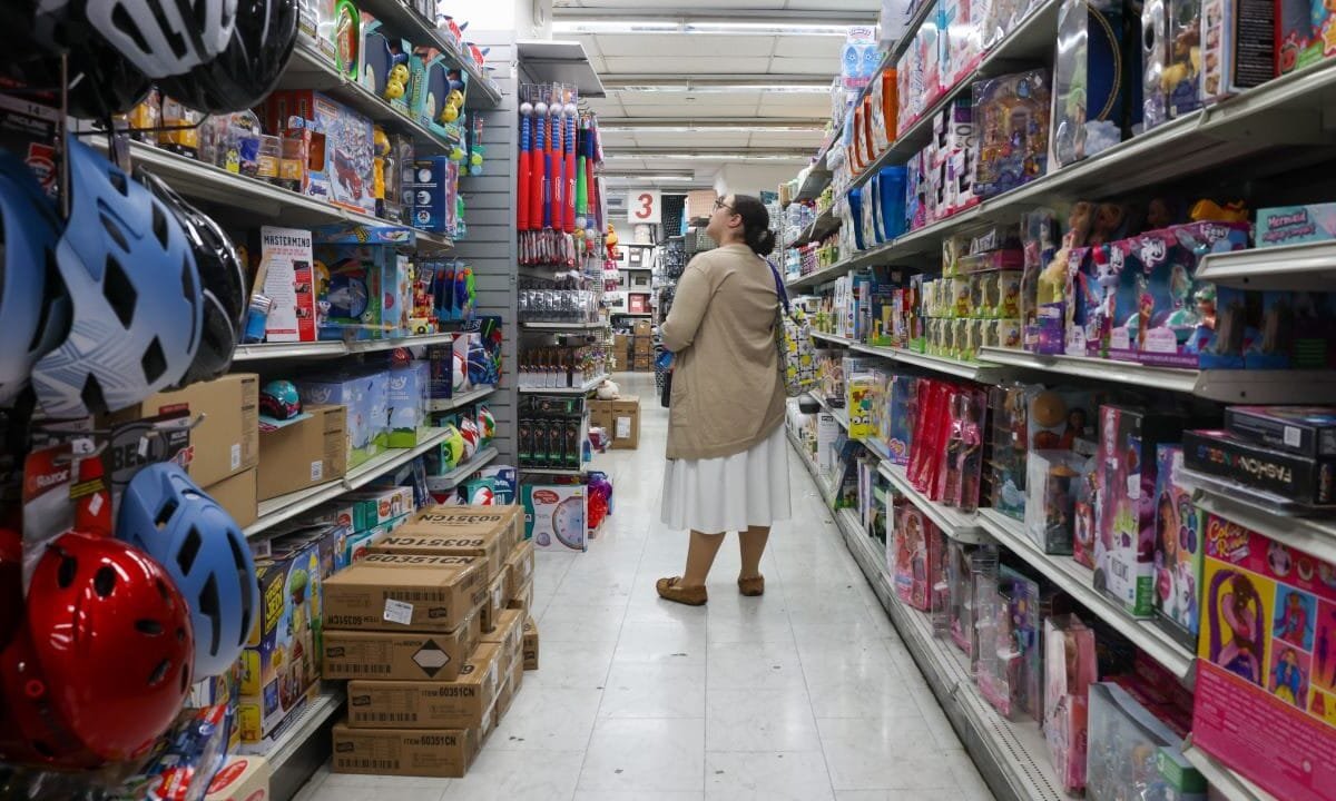 Middle-income Americans struggling to keep up as living costs weigh on paychecks, survey says